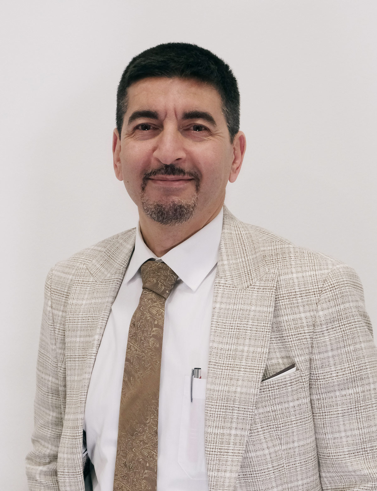 Dr. med. Basel Allozy